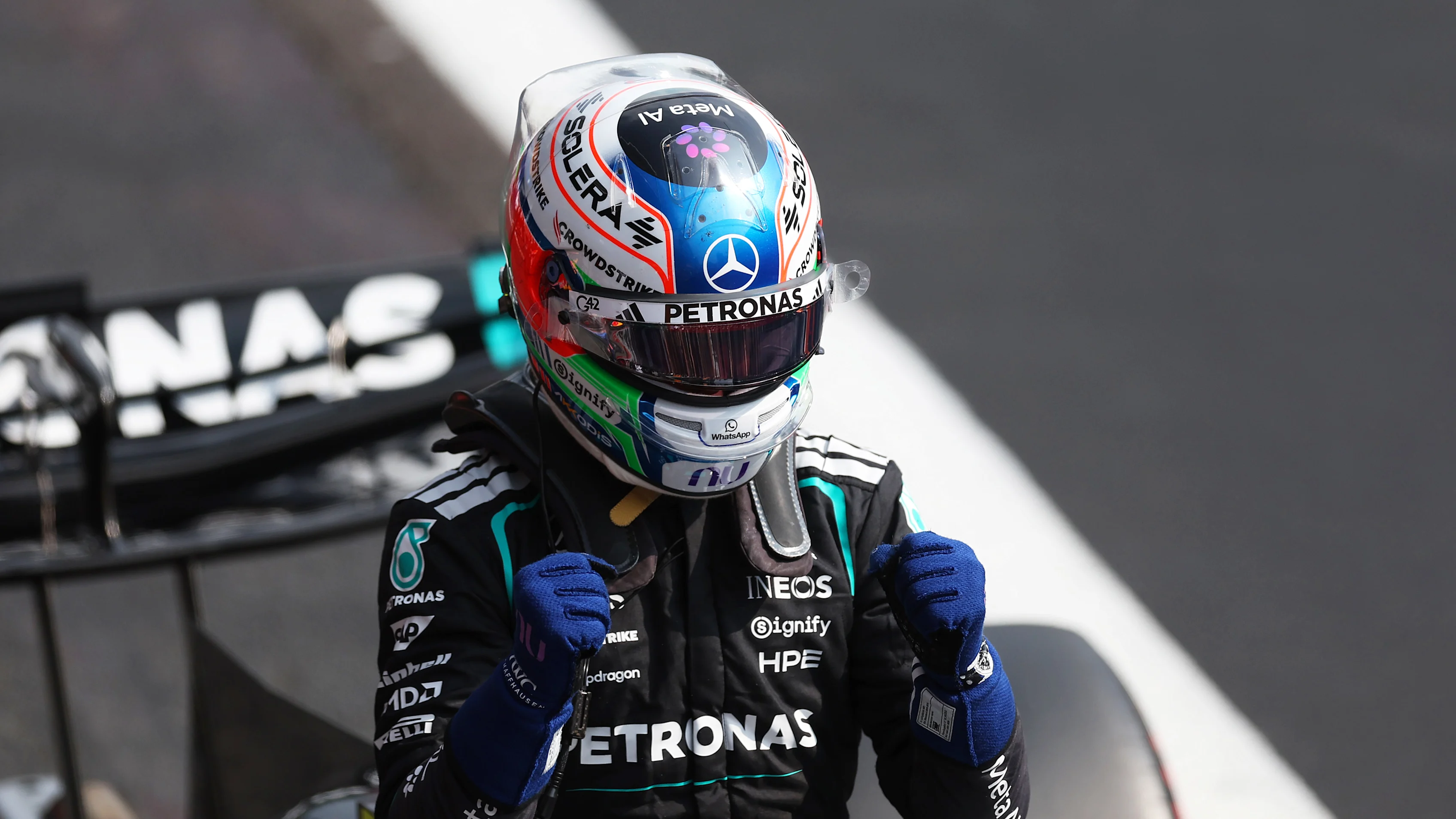 Mercedes driver Kimi Antonelli celebrating beside his car at Spa-Francorchamps during the Belgian Grand Prix weekend.