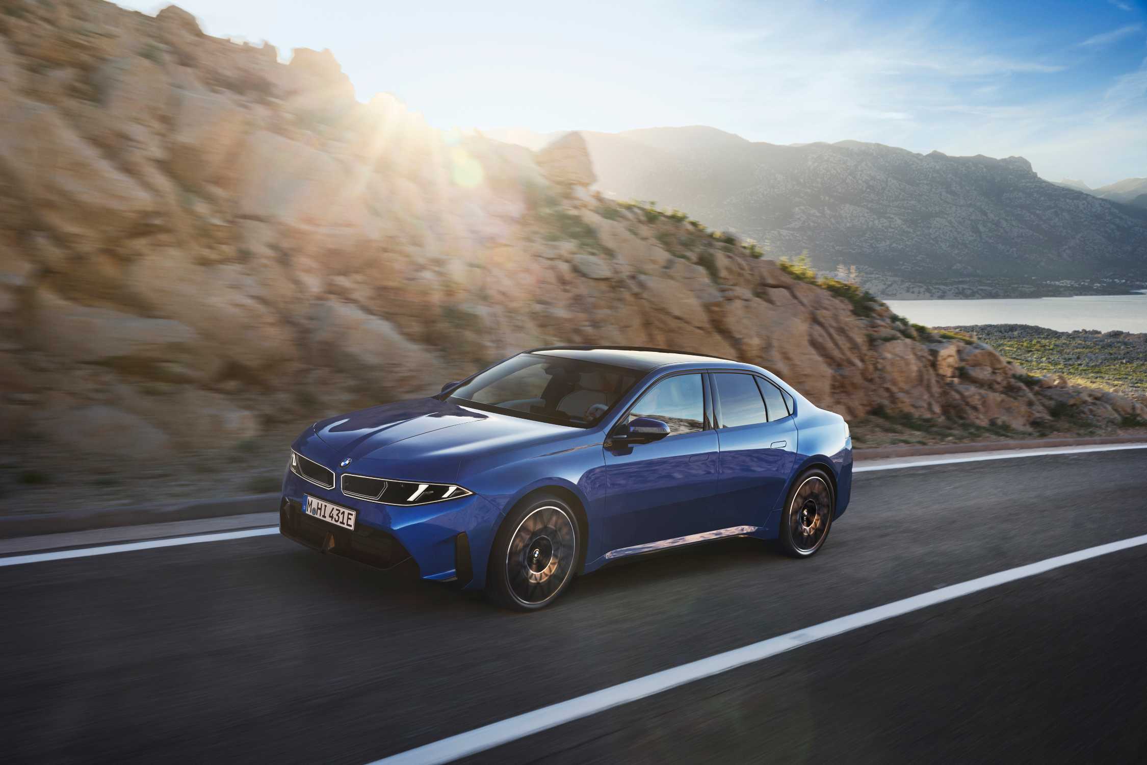 Official BMW image of a blue BMW i3 50 xDrive, the electric member of the new 3 Series family.