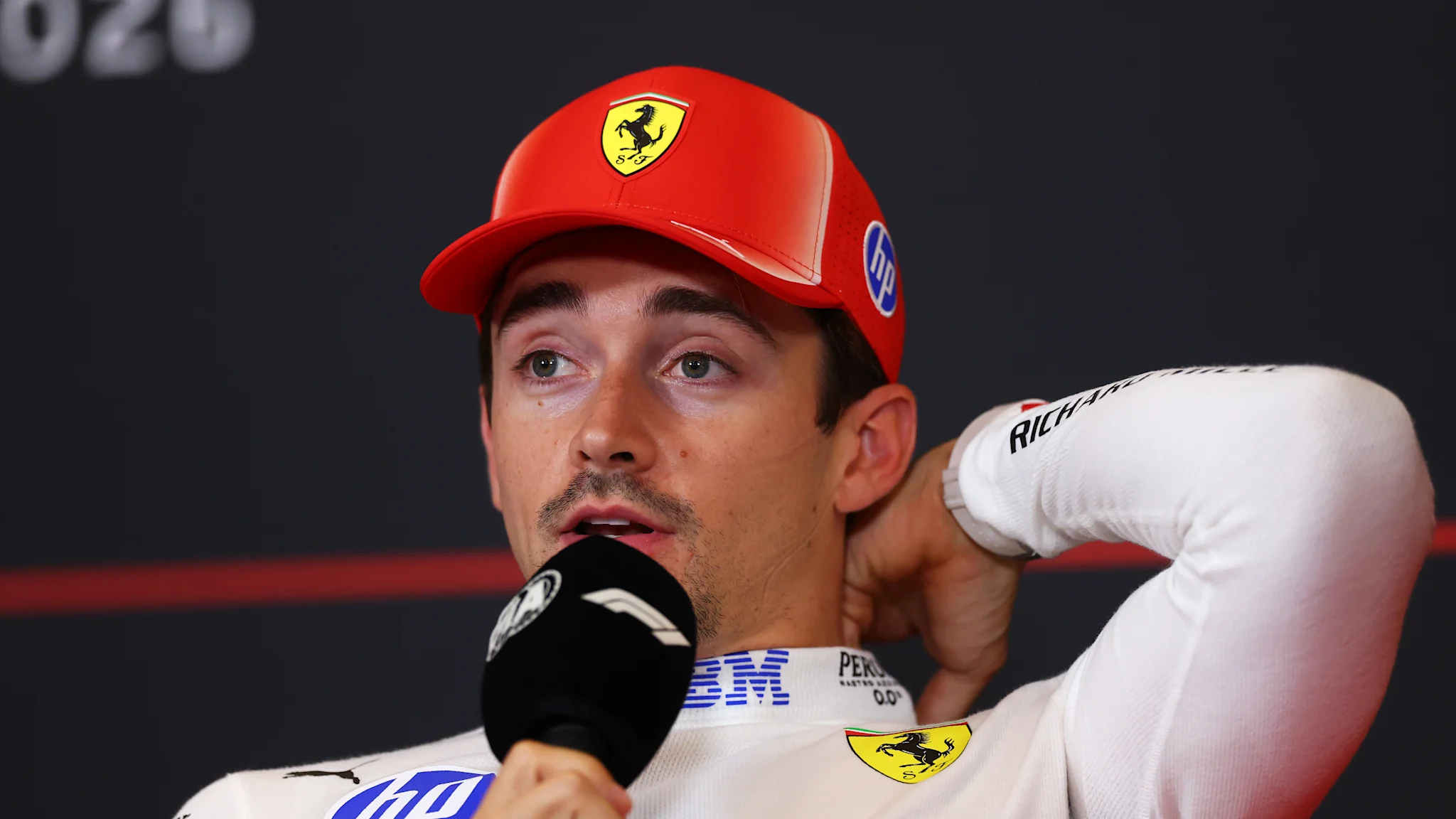 Charles Leclerc driving a Ferrari Formula 1 car at the Red Bull Ring during the 2026 Austrian Grand Prix weekend.