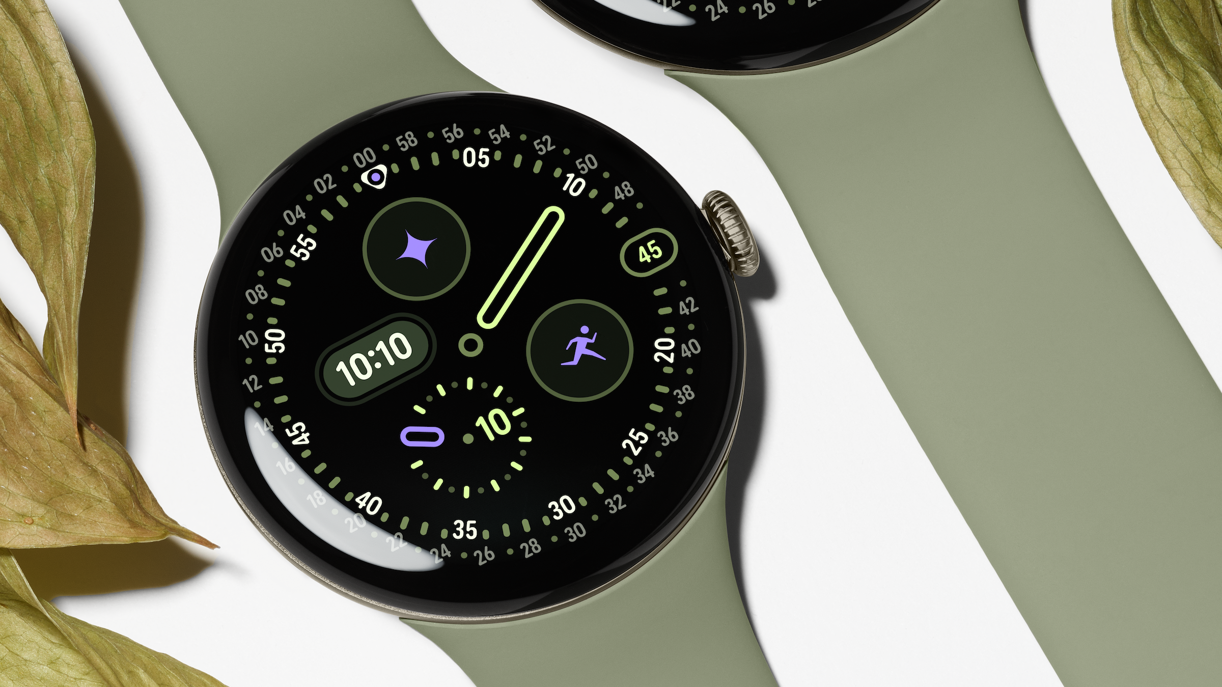 Official Google product image showing the Pixel Watch 5 with an olive Active Band.