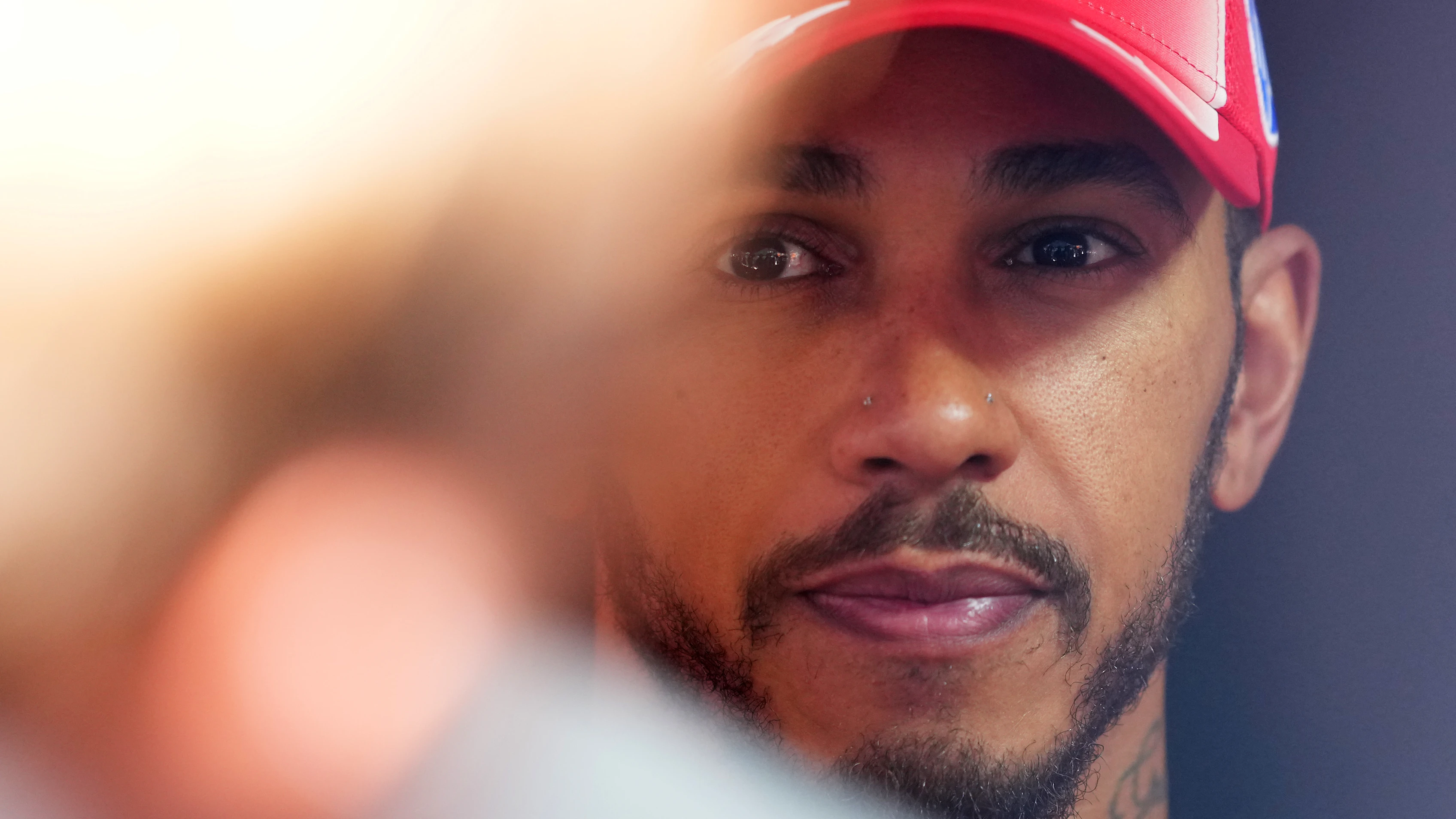 Lewis Hamilton in Ferrari teamwear during the Belgian Grand Prix weekend at Spa-Francorchamps.
