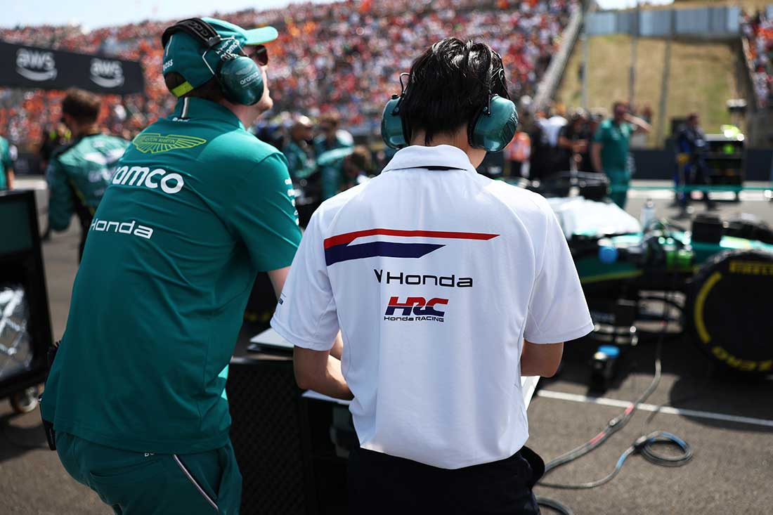 Honda Racing engineer watches Aston Martin cars from the Zandvoort pit lane.