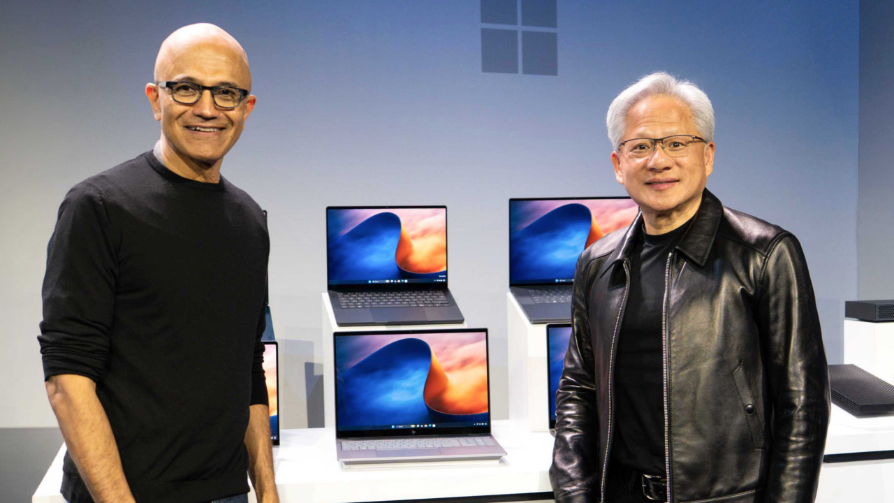 NVIDIA CEO Jensen Huang and Microsoft CEO Satya Nadella at the Windows and Surface event announcing RTX Spark PCs.