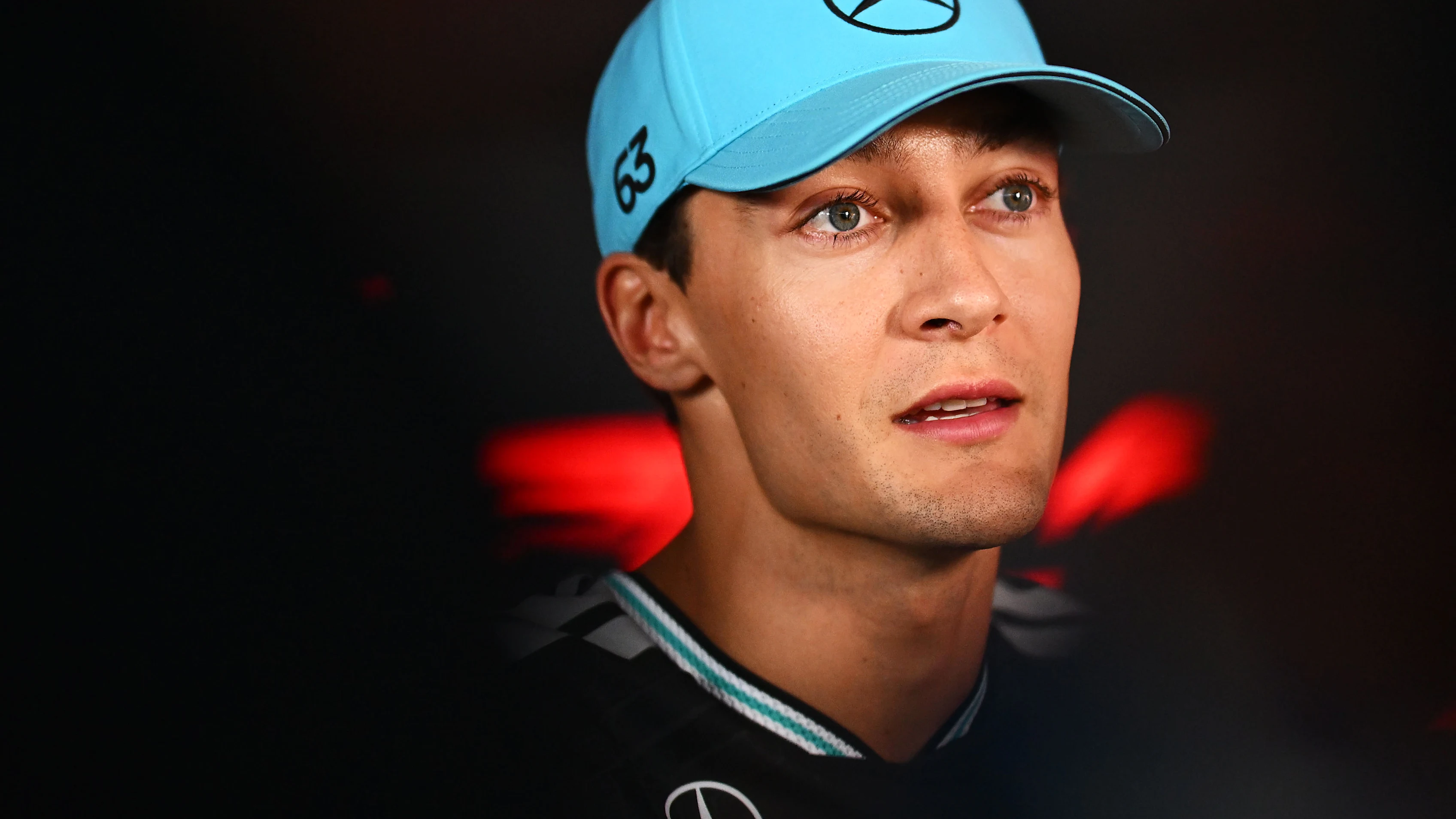 George Russell speaking in Mercedes team kit ahead of the Hungarian Grand Prix.