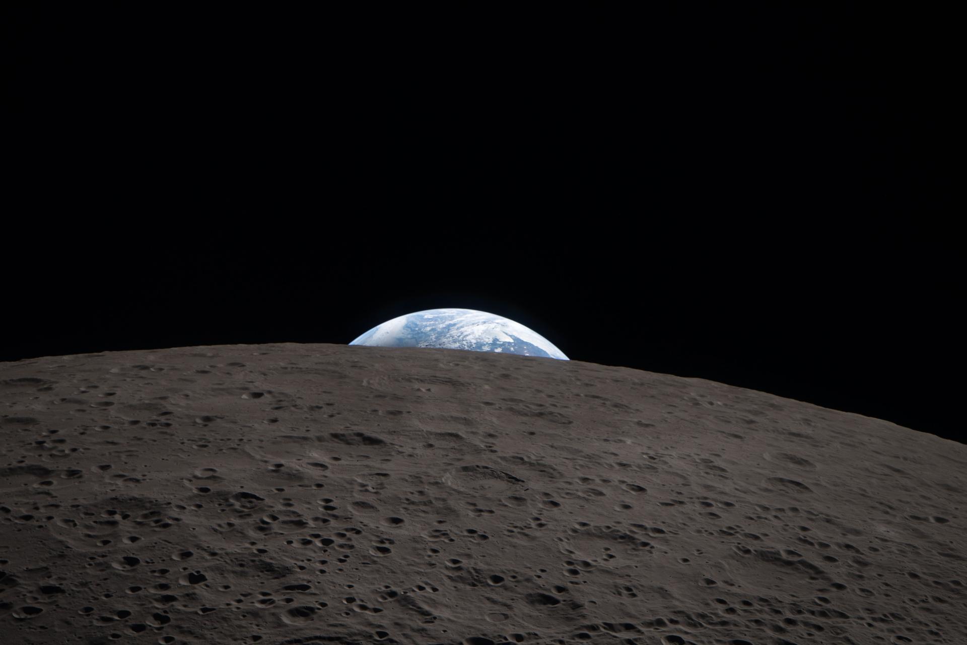 NASA concept art showing Orion docked nose-to-nose with SpaceX's Starship human landing system test article.