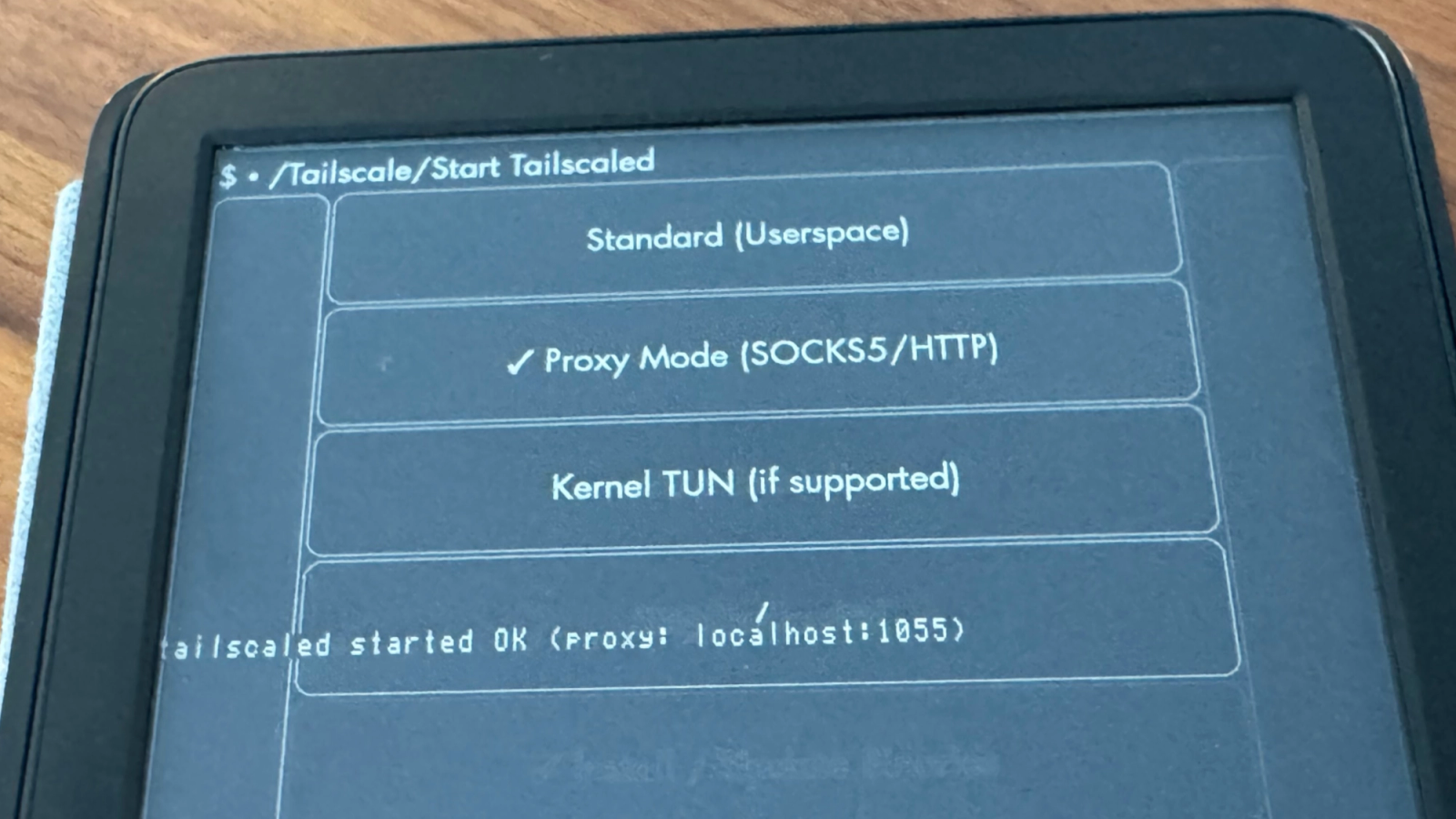 Official Tailscale blog image of a Kindle showing Standard, Proxy Mode and Kernel TUN options for Tailscale.
