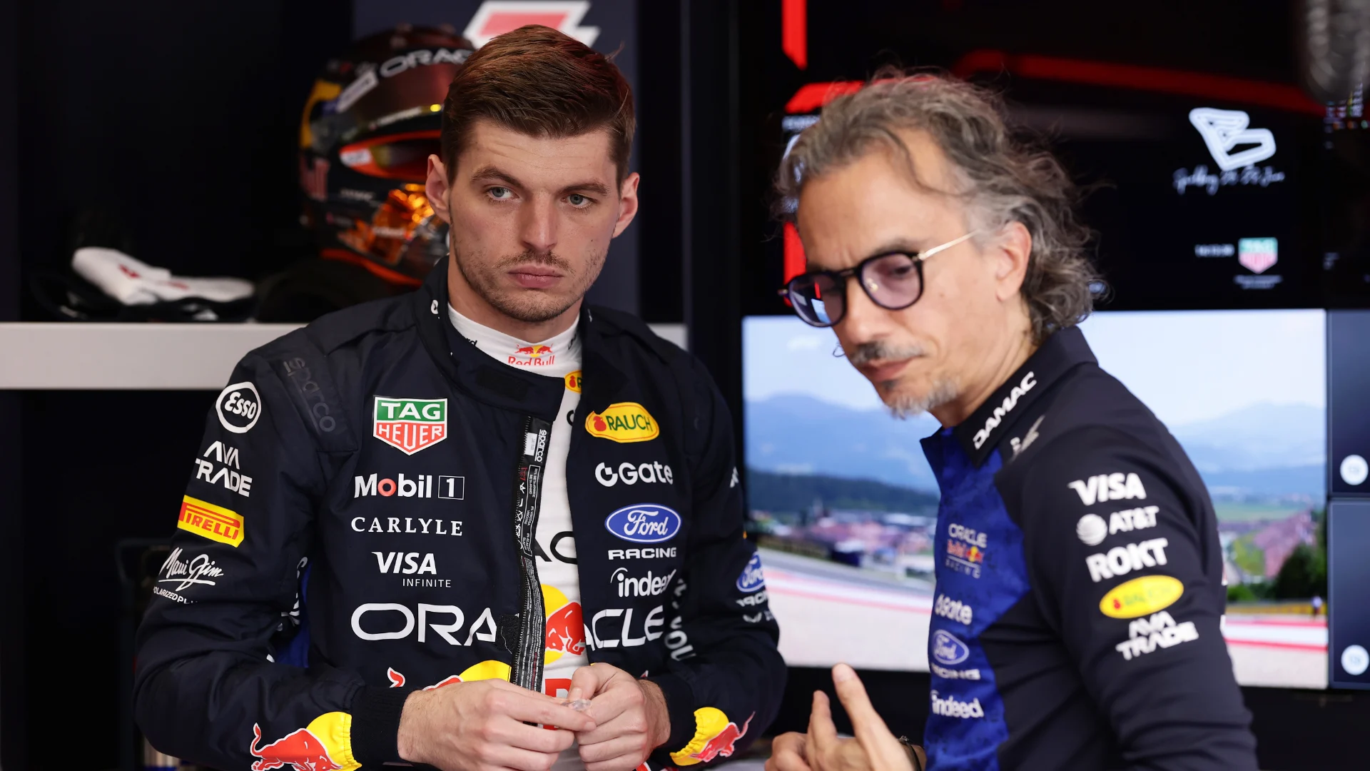 Max Verstappen and Laurent Mekies in the Red Bull garage during the British Grand Prix weekend.